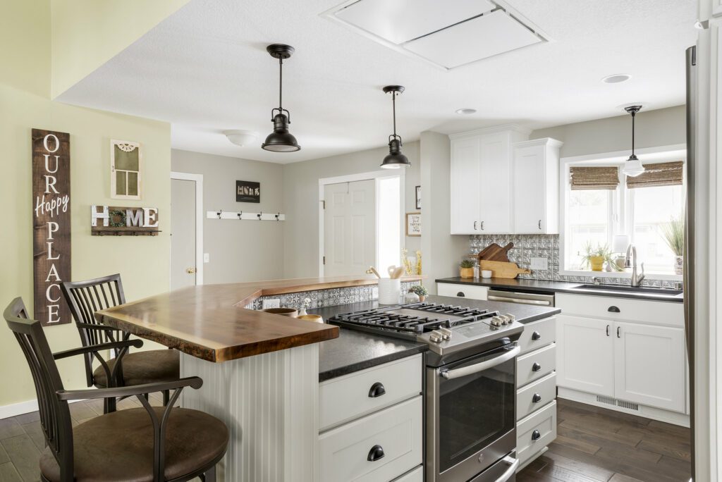 Kitchen remodel by White Birch Design, A Lakeville MN based remodeler  Featuring A Two Tier Kitchen Island